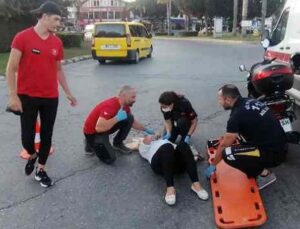 Kadın motosiklet sürücüsünü kaskı hayatta tuttu